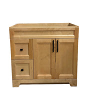 36" natural wood vanity with black handles
