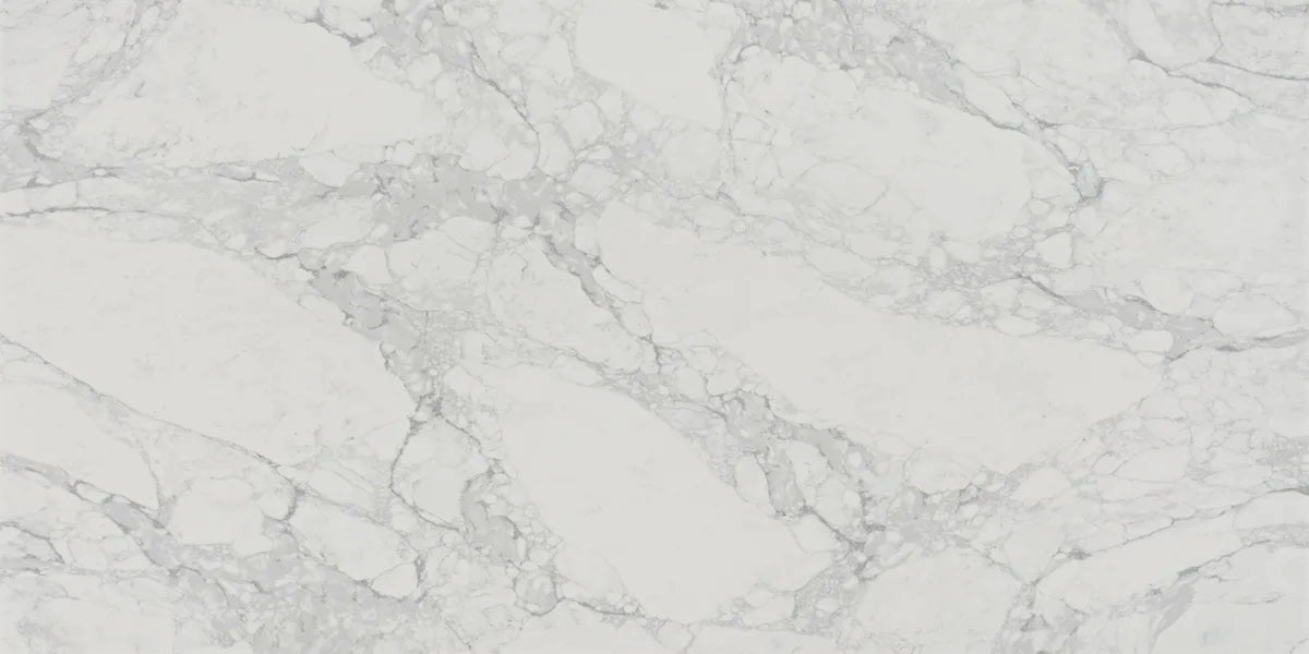 Carrara Mist white quartz countertop slab with dense grey veining