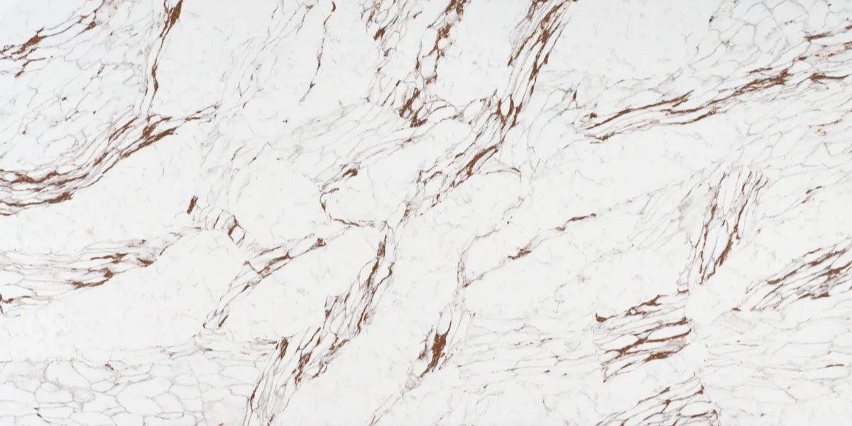 Copper Canyon white quartz countertop slab with bold reddish-copper veining