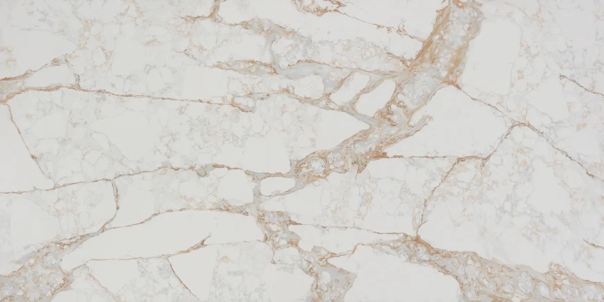 Crystal Canyon white quartz countertop slab with copper-gold veining and crystalline texture
