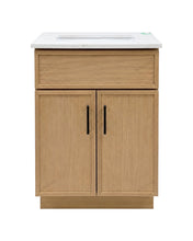 Oaklyn 24"- a modern bathroom vanity cabinet with a light oak wood finish, featuring two doors with black vertical handles and a white quartz countertop with sink.