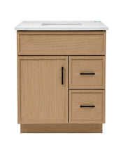Oaklyn 30" modern bathroom vanity in oak wood finish with one door and two drawers, and a white quartz countertop with sink. 