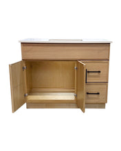 Solid wood bathroom vanity in natural oak colour with open doors