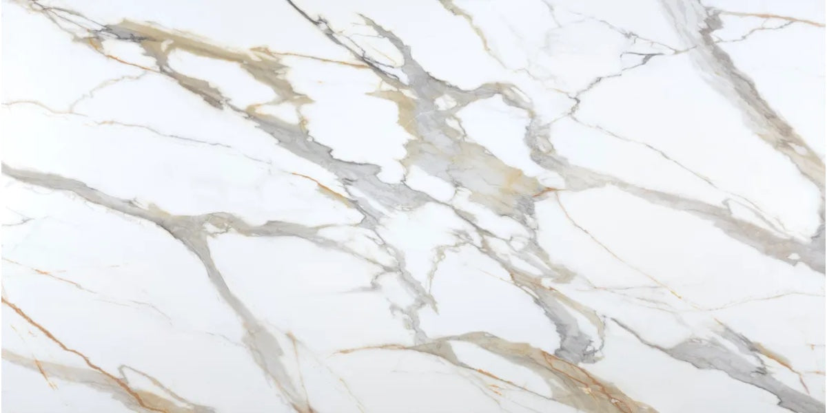 Amber Drift white quartz countertop slab with grey veining and amber accents