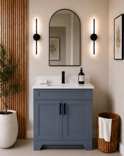 Pearl 36" dark grey bathroom vanity with black hardware and white quartz countertop, styled in a modern bathroom with wood slat accent wall