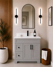 Pearl 36" light grey bathroom vanity with drawers, black hardware and white quartz countertop, styled in a modern bathroom with wood slat accent wall