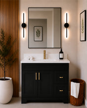 Pearl 42" black bathroom vanity with drawers, brushed gold hardware and white quartz countertop, styled in a modern bathroom with wood slat accent wall