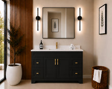 Pearl 48" black bathroom vanity with drawers, brushed gold hardware and white quartz countertop, styled in a modern bathroom with wood slat accent wall