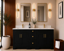 Pearl 60" black double sink bathroom vanity with brushed gold hardware and white quartz countertop, styled in a modern bathroom with wood slat accent wall