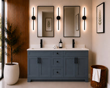 Pearl 60" dark grey double sink bathroom vanity with black hardware and white quartz countertop, styled in a modern bathroom with wood slat accent wall