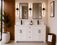 Pearl 60" white double sink bathroom vanity with black hardware and white quartz countertop, styled in a modern bathroom with wood slat accent wall