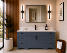 Pearl 72-inch dark grey single-sink bathroom vanity with black hardware, quartz countertop, and matte black faucet, styled in a modern bathroom with a black-framed mirror, black wall sconces, and wood slat accent wall.