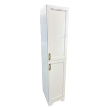 White tall bathroom cabinet with gold handles.