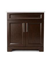 Sapphire 30" Smoked Walnut- A dark brown wood bathroom vanity cabinet with two doors, brushed nickel handles, and a white countertop.