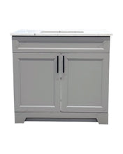 36-inch light grey solid wood bathroom vanity with black handles on doors