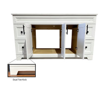 White vanity with open doors, and a focus on the dual toe-kick design. 