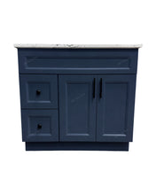 Topaz 36-inch bathroom vanity in navy blue finish with white quartz countertop, double doors and left-side drawers