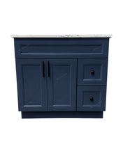 Topaz 36-inch bathroom vanity in navy blue finish with white quartz countertop, double doors and right-side drawers