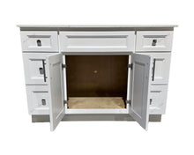 white wood bathroom cabinet with open doors
