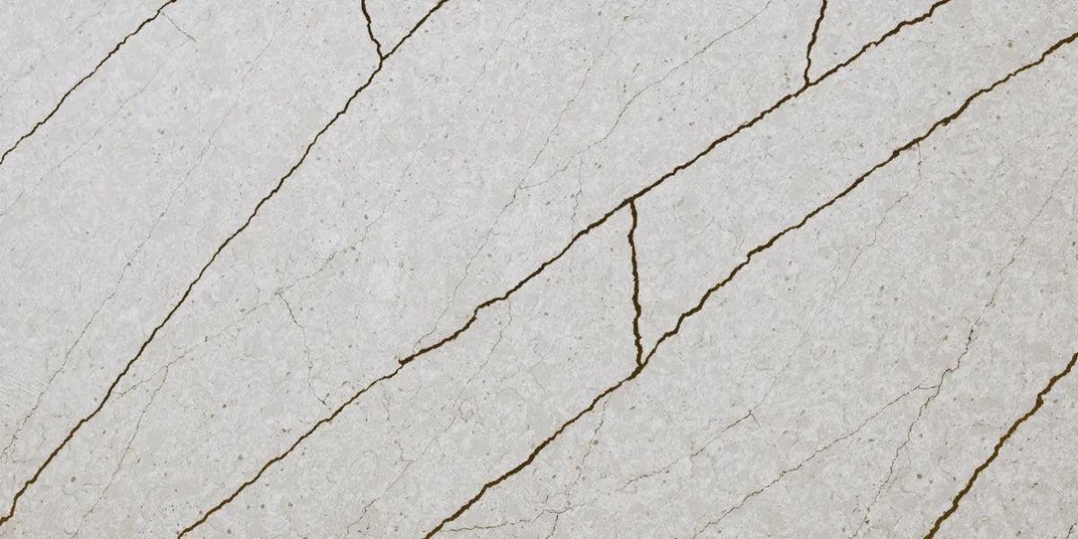 Etched Stone grey quartz countertop slab with dark veining and shimmer